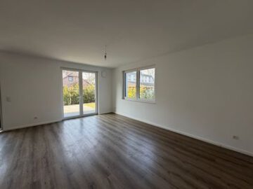 #IMMOTIONAL ERDGESCHOSS-WOHNUNG MIT GARTENBEREICH NÄHE SPECKENBÜTTELER PARK - Wohnzimmer