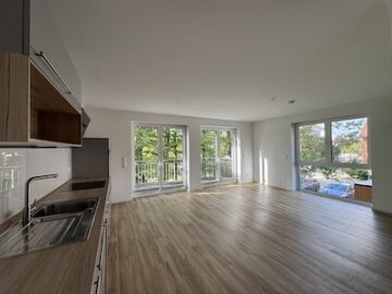 #IMMOTIONAL - MIETWOHNUNG IN ZENTRALER LAGE VON HEMMOOR - Blick ins Wohnzimmer