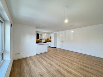 # IMMOTIONAL - KLIMAFREUNDLICHE NEUBAUWOHNUNGEN NACH QNG IN BAD BEDERKESA - WOHNUNG 1 - Blick zur Küche