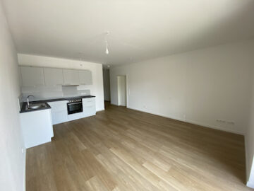 #IMMOTIONAL 2-ZIMMER-NEUBAUWOHNUNG IN BEDERKERSA - Offener Wohnbreich Blick in den Flur